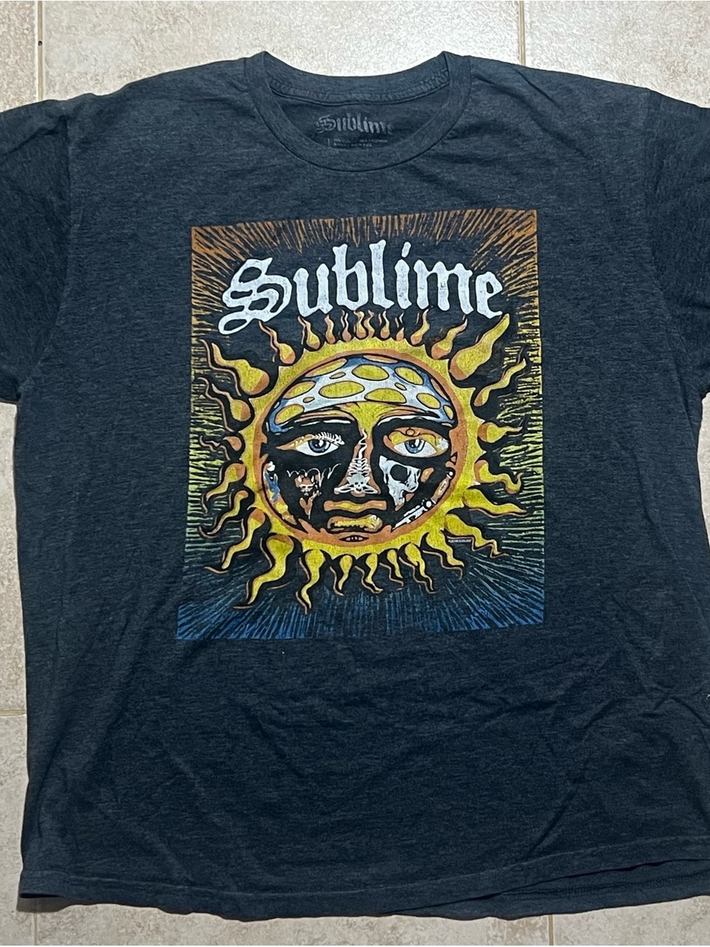 Unk Sublime Black Graphic Tee with Yellow Sun Design